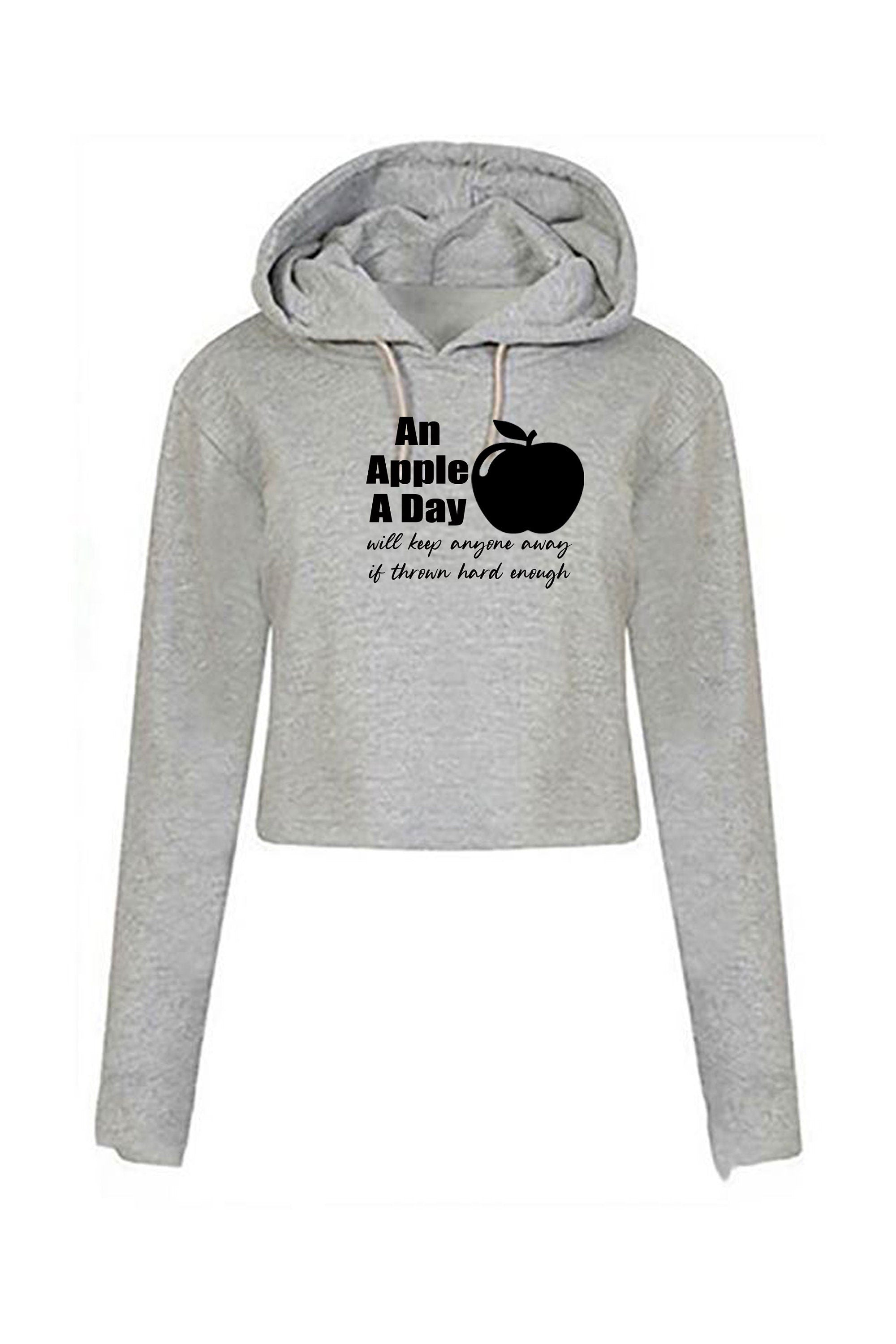 An apple a day will keep anyone away if thrown hard enough Funny Doctors Birthday Gift Ladies Crop Tops Hoodie Hood Crop-top Croptop Joke